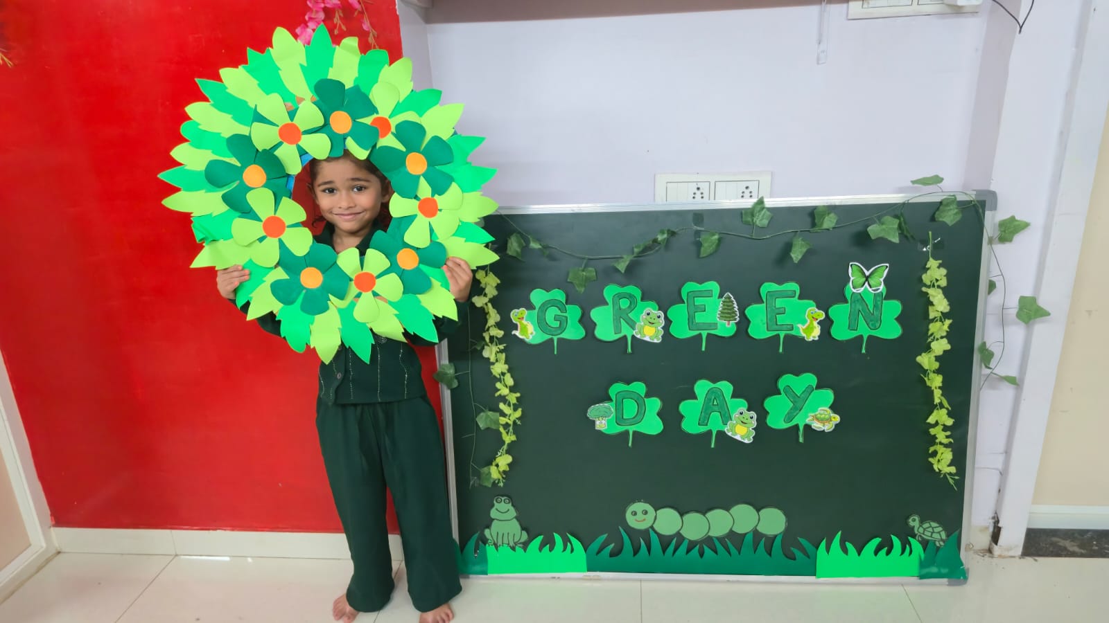 A child celebrating Green Day at I-Kiddz